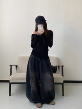 ダメージウォッシュ加工ジーンズ